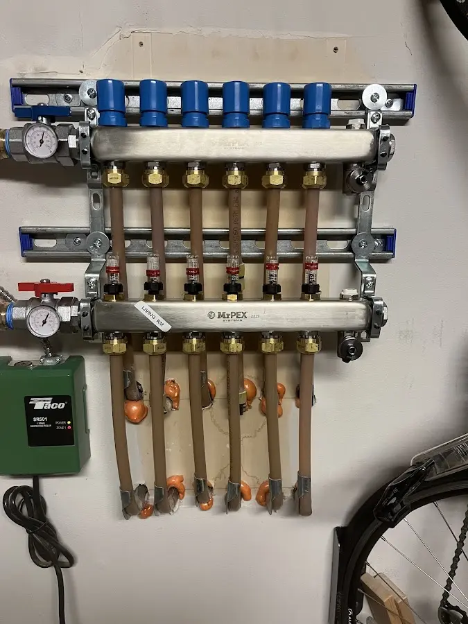 Plumber performing Gas Line Installation at a residential property in Emerson